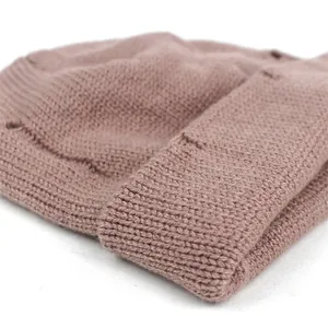 Fashionable dusty rose knit beanie hat for winter, warm soft ribbed knit design for outdoors