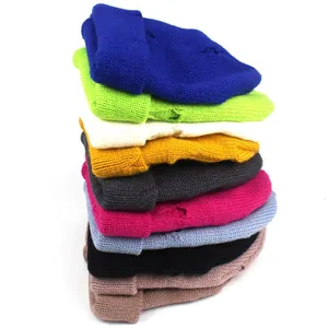 Distressed knit beanies in 9 colors featuring a folded brim and stylish ripped details