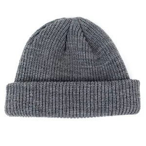 Detailed view of the ribbed knit texture and wide folded cuff on a grey beanie hat