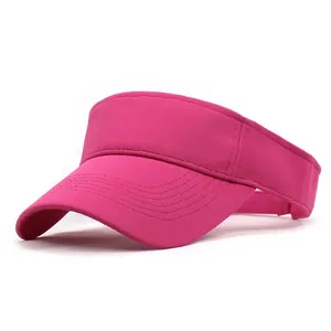Detail of rose red visor cap fabric texture and reinforced stitching on the brim