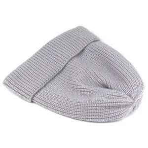 Close-up of light gray ribbed knit beanie with cuffed design for winter warmth