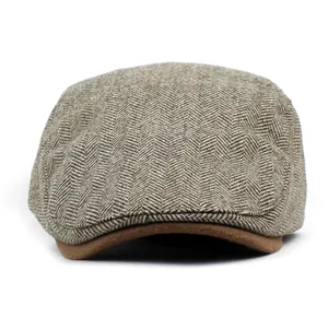 Classic men's herringbone flat cap in brown wool blend with vintage peak design
