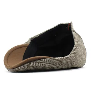 Men's vintage brown herringbone wool flat cap with solid brim for winter fashion