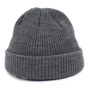 Detailed view of the dark grey ribbed knit texture on this warm winter beanie hat