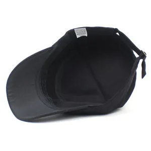 Black cotton military flat top cap with adjustable buckle and internal cotton label