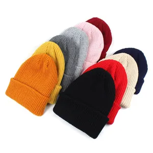Solid color acrylic knit beanies for men and women in nine vibrant winter colors