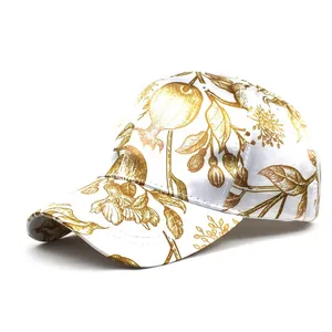 Detailed view of the silk-like satin texture and floral print on the baseball cap