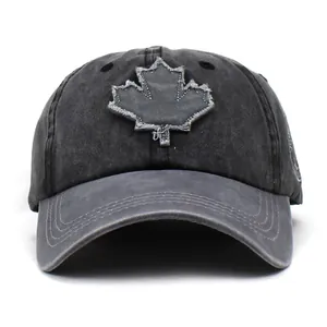 Vintage washed cotton baseball cap with maple leaf patch and frayed edges for outdoors