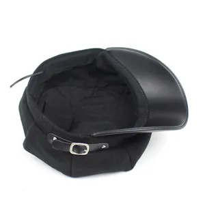 Fashionable black wool newsboy cap with glossy leather brim and silver metal buckle
