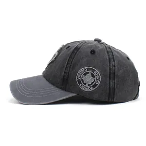 Close-up of Canada maple leaf embroidery on washed cotton retro gray baseball cap