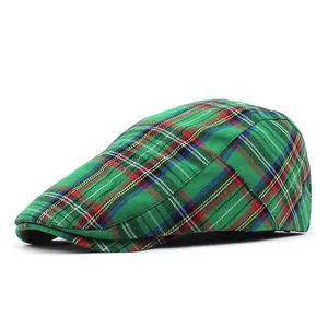 Side view of a classic green plaid flat cap featuring vibrant tartan patterns and crisp lines