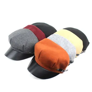 Retro wool newsboy cap for women with leather brim and side metal buckle strap details