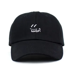 Classic black cotton baseball cap with white smile embroidery and curved brim for sun protection