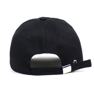 Rear view of black cotton baseball cap with adjustable silver metal buckle and side ring