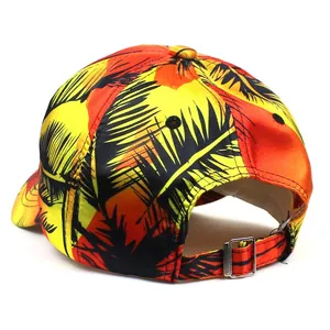 Silky tropical baseball cap with yellow orange gradient and black palm tree print