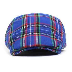 Classic British plaid flat cap in royal blue cotton blend for men and women outdoors