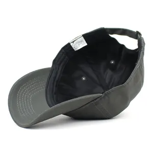 Inside view of adjustable dark green cotton baseball cap with sweatband and stitching details