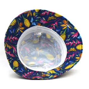 Floral print faux silk bucket hat for women with tropical pattern and white lining view