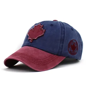 Vintage washed cotton baseball cap with maple leaf patch in navy and burgundy