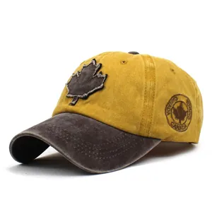 Detail of washed cotton baseball cap with maple leaf patch and Canada side embroidery