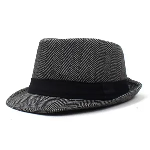 Detail of dark grey herringbone wool felt fedora hat for men with black ribbon band