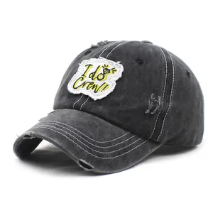 Distressed black cotton baseball cap with embroidered I do Crew patch and ring icon