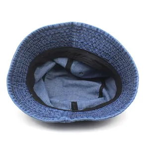 Classic blue denim bucket hat with white stitching and a black sweatband interior
