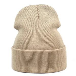 Detailed close-up showing the fine ribbed knit texture of this khaki acrylic beanie hat