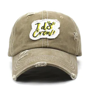 Vintage khaki washed cotton baseball cap featuring I do Crew embroidery and distressed holes