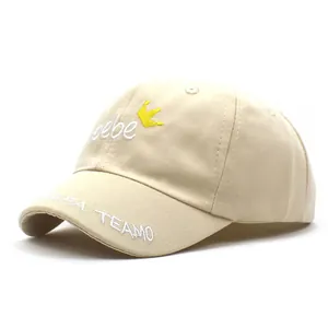 Detail of baby baseball cap with bebe crown embroidery and PAPA TEAMO text on brim
