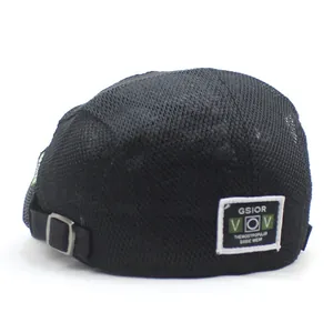 Men's black mesh breathable newsboy cap with stylish letter patches for outdoor sun protection