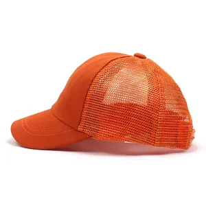 Side view of children's orange mesh baseball cap with breathable back and adjustable snap