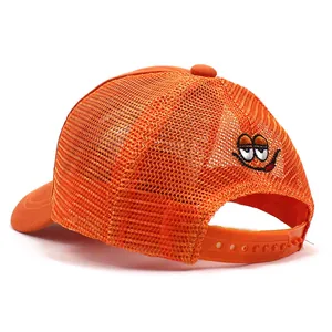 Detail of orange mesh truck cap with cartoon embroidery and adjustable snapback closure