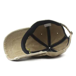 Distressed khaki cotton baseball cap with vintage frayed edges and 100% cotton material