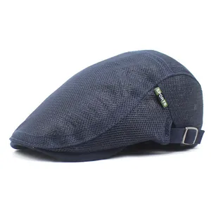Close-up of breathable navy mesh fabric with SPORTS label and adjustable metal buckle