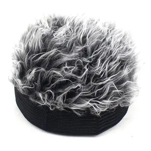 Detail of creative wig hat featuring grey and black curly faux hair with elastic black mesh band