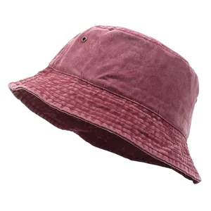 Detail of burgundy washed canvas bucket hat with metal eyelets and reinforced stitching