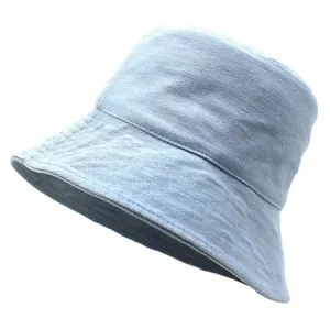 Classic light blue denim bucket hat with wide brim and stitched detailing for summer sun
