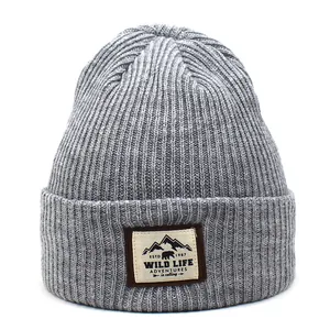 Dark grey ribbed knit beanie for men and women featuring a Wild Life outdoor patch