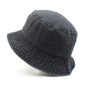 Classic washed denim bucket hat in dark grey cotton for sun protection and travel