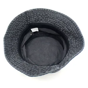 Washed dark gray cotton bucket hat for sun protection featuring a foldable packable design