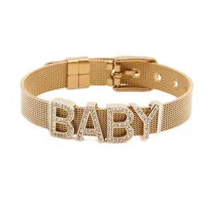 Gold stainless steel mesh bracelet with sparkling BABY rhinestone letter charms and buckle