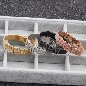 Detail of baby letter mesh bracelets in gold, silver, black and rose gold stainless steel