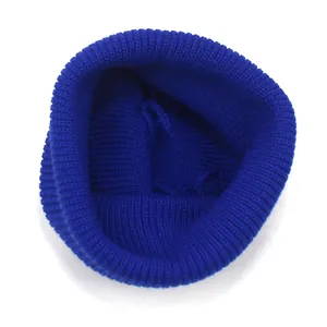 Vibrant royal blue ribbed knit beanie hat for women featuring a warm short fisherman style