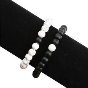 Set di bracciali a distanza con marmo bianco e perline di agata nera opaca per coppie