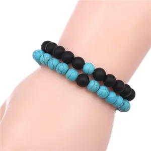 Matte black agate and turquoise beaded bracelet set for men and women on wrist
