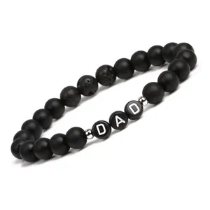 Matte black stone beads bracelet for men with DAD letter charms and lava rock accents