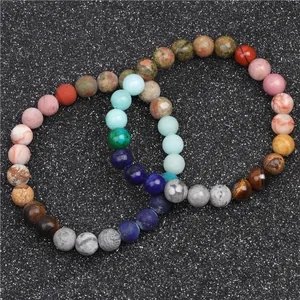 Set di due braccialetti elastici con perline di pietre naturali da 8mm e occhio di tigre