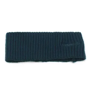 Deep blue ribbed knit headband for women with embossed lettering on a white background
