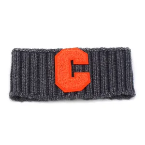 Dunkelgraues Rippstrick Stirnband für Sport mit orangem Stickerei-Buchstabe C
